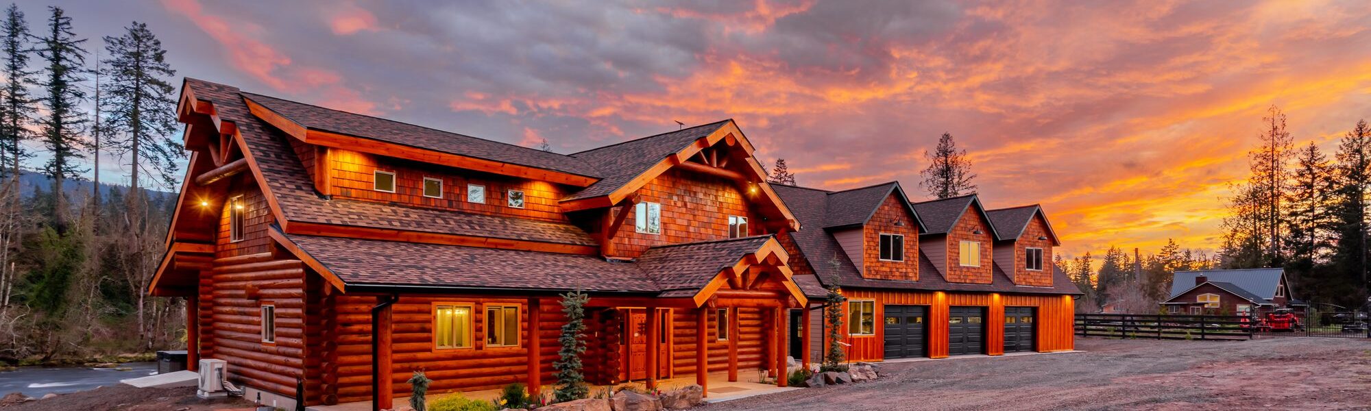 The River Lodge at sunset — a handcrafted log lodge in the Santiam Canyon, Gates, Oregon